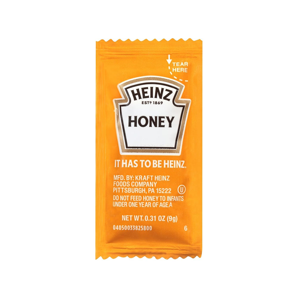 Heinz Honey single-serve packet front view for quick, convenient sweetening.