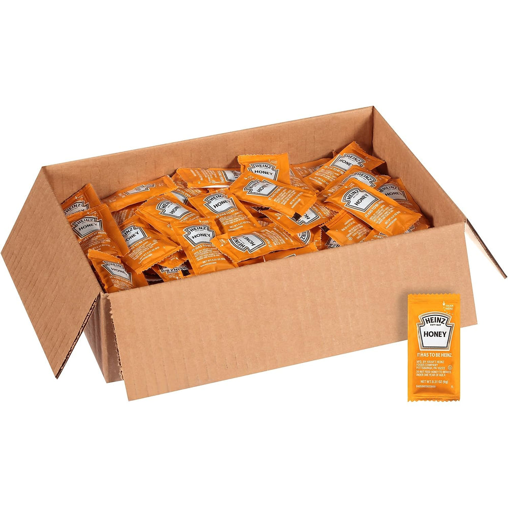 Heinz Honey packaging close-up shows 9 g packets for efficient front-of-house use.