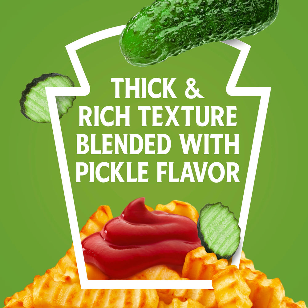 Heinz Ketchup bottle on grill beside hot dogs shows grilling-friendly flavor.