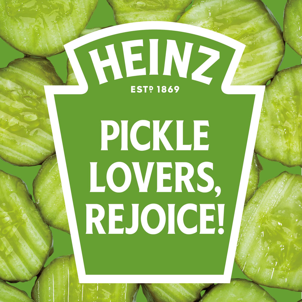 Heinz Pickle-Ketchup bottle with dill-tinted sauce on plate suggests versatile burger pairing.