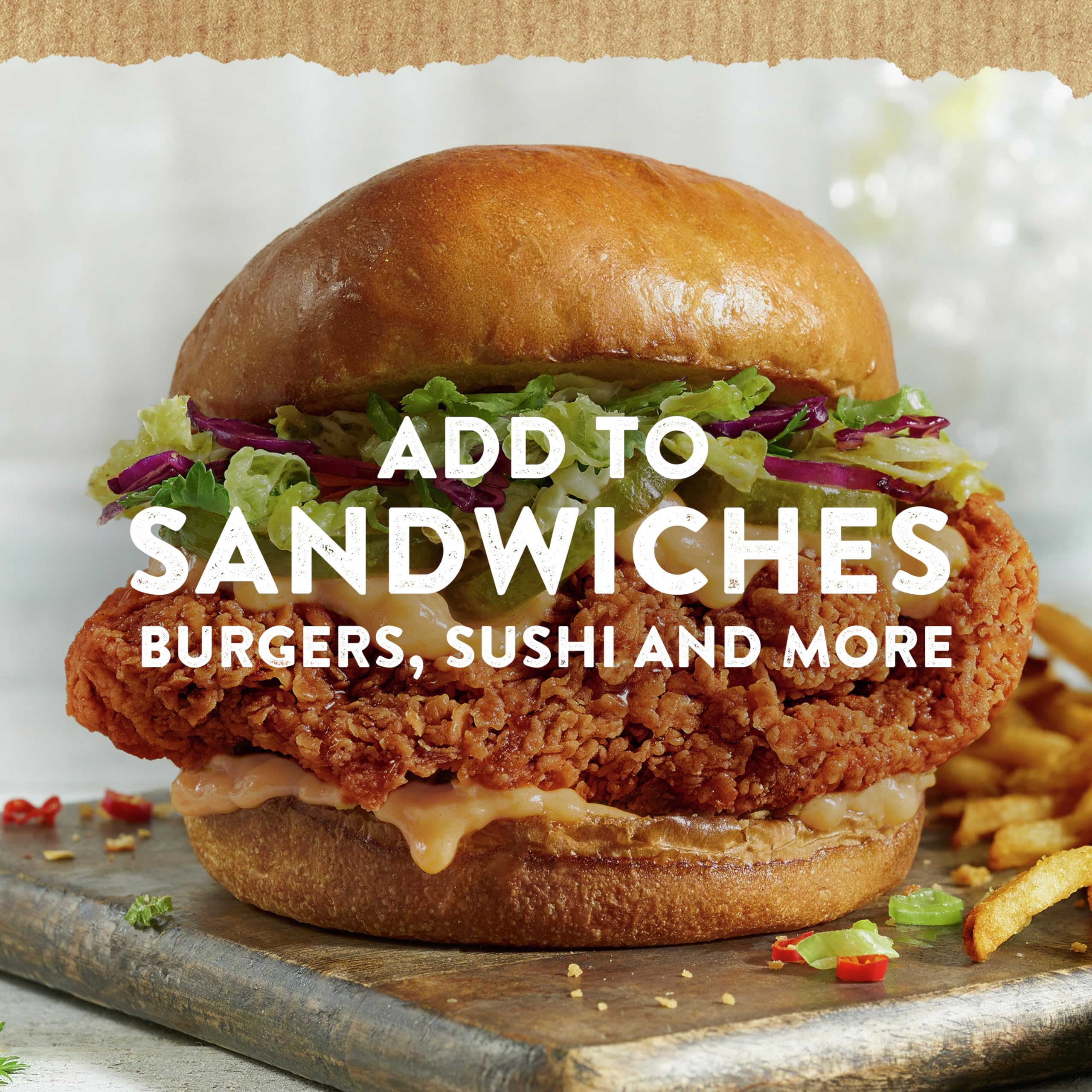 Hellmann's Spicy Mayonnaise Dressing on a burger with fries shows easy flavor boost