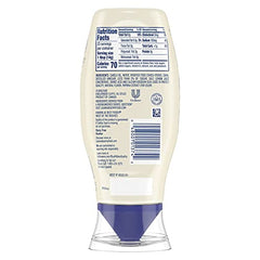 Hellmann's Vegan Dressing & Spread beside a vibrant salad bowl.