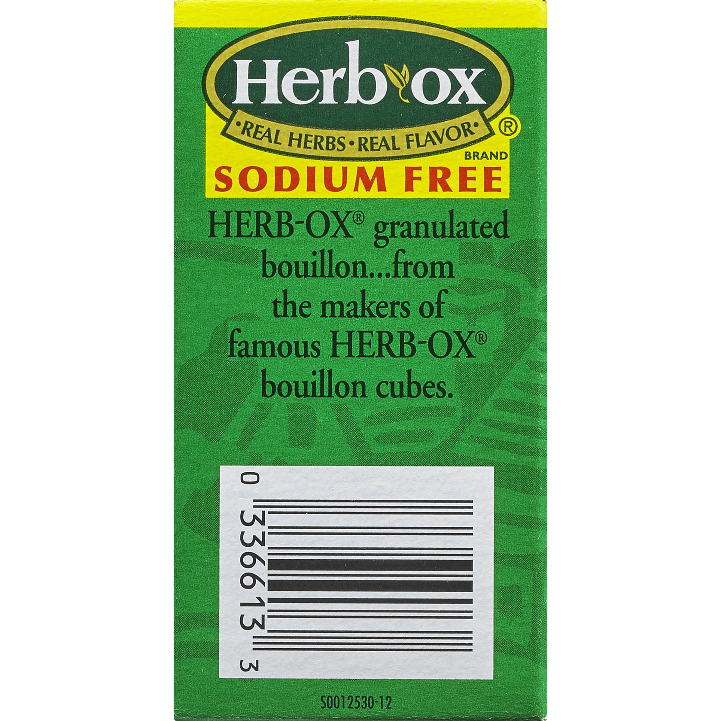 Spoon dispersing Herb-Ox granules into water for instant seasoning.