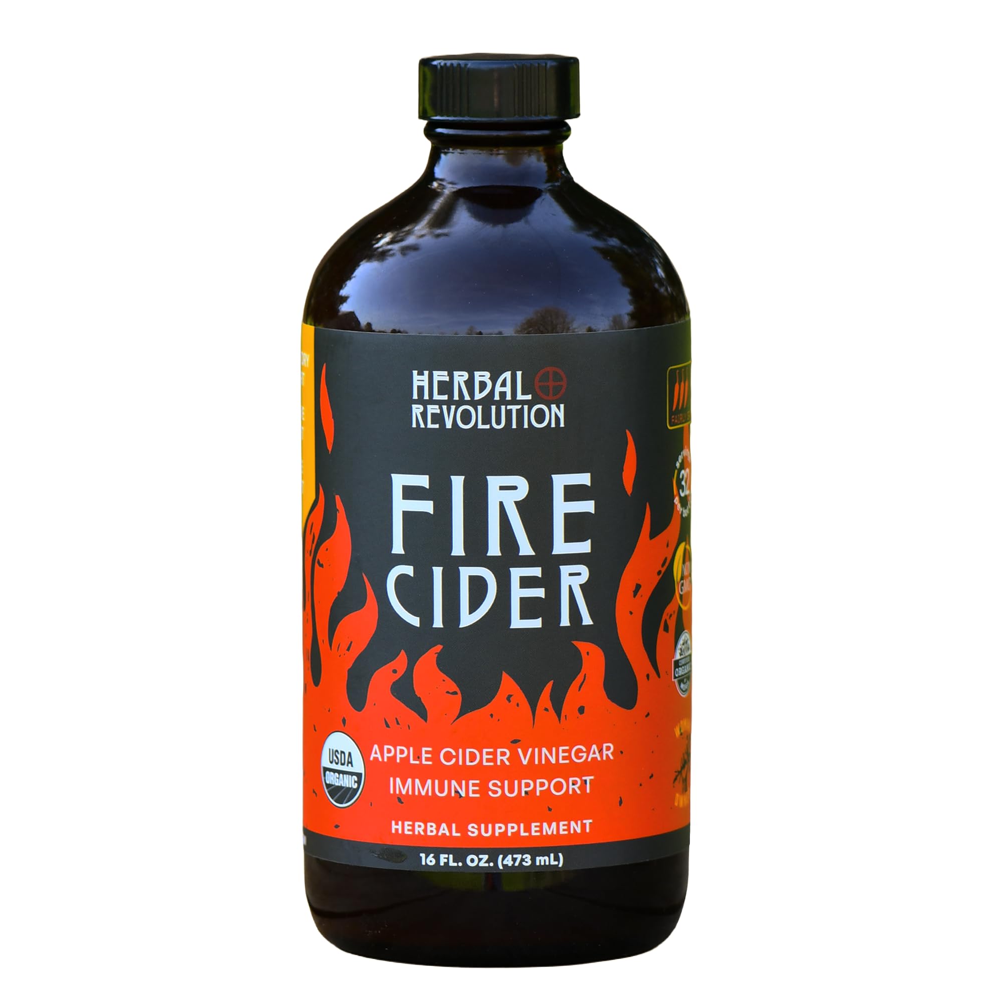 Herbal Revolution Fire Cider bottle being poured for warming flavor.