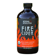 Herbal Revolution Fire Cider bottle being poured for warming flavor.