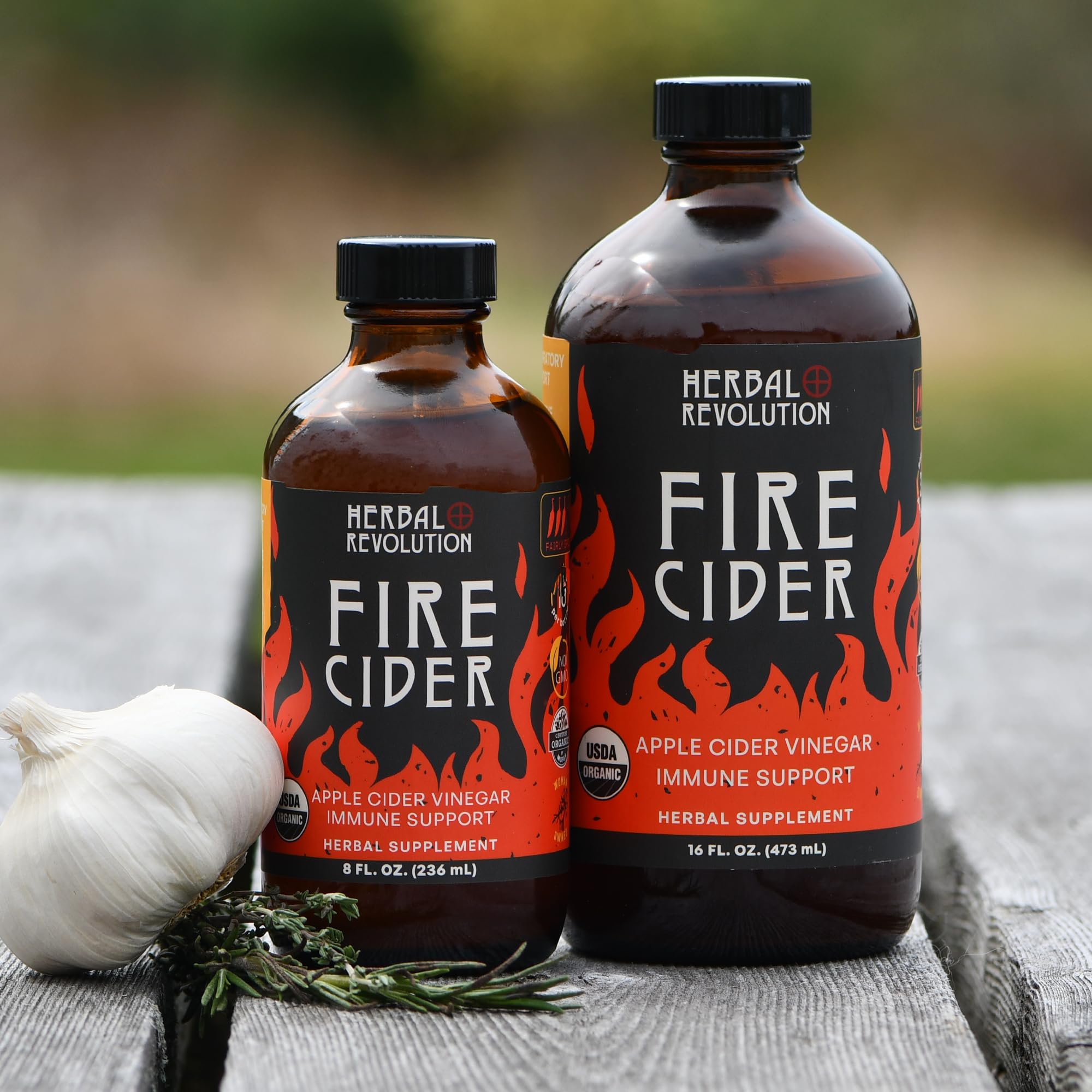 Herbal Revolution Fire Cider ready-to-use spicy dressing enhancer beside ingredients.