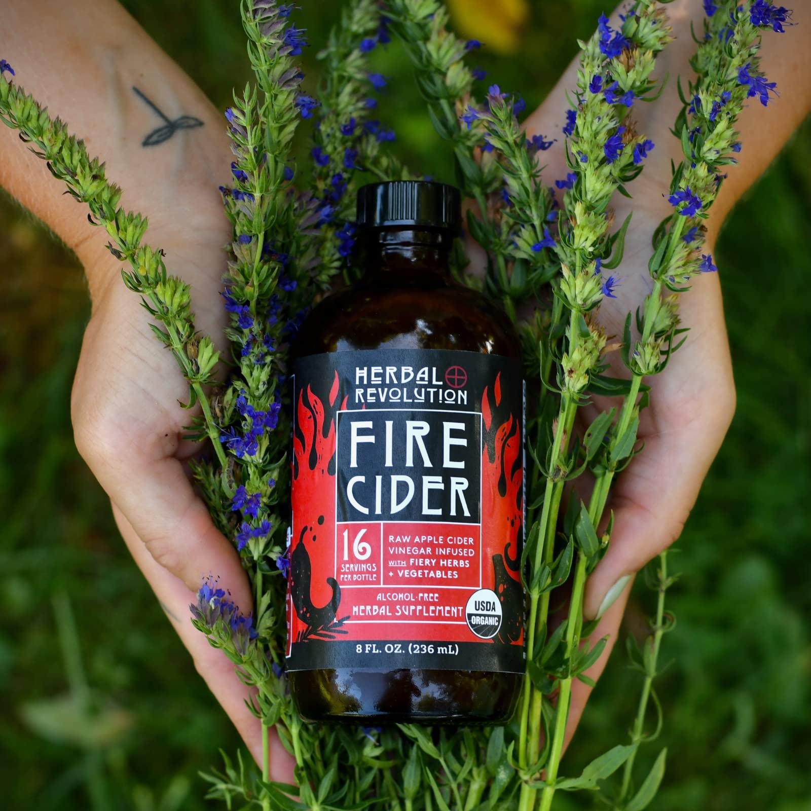 Herbal Revolution Fire Cider label emphasizes organic farming and regenerative practices