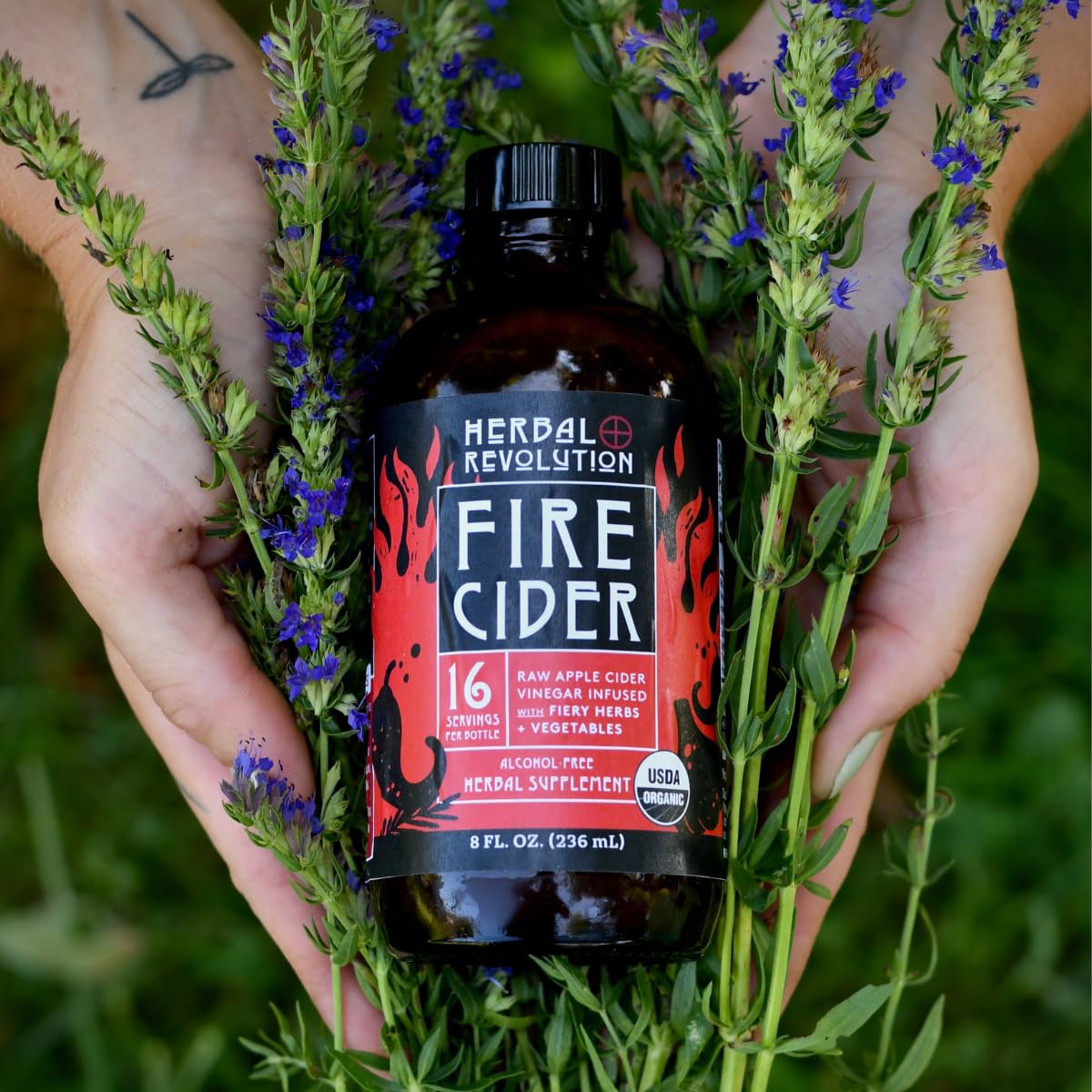 Herbal Revolution Fire Cider close-up shows the raw ACV Mother culture, unheated for flavor.