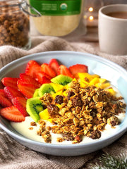 HerbaZest Amaranth Flakes sprinkled on granola for a crunchy breakfast boost.