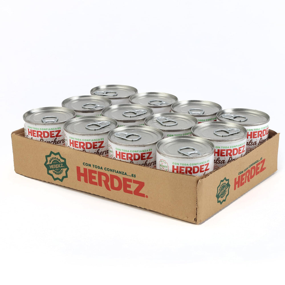 Herdez Ranchera Salsa can close-up, fresh ingredients for tacos