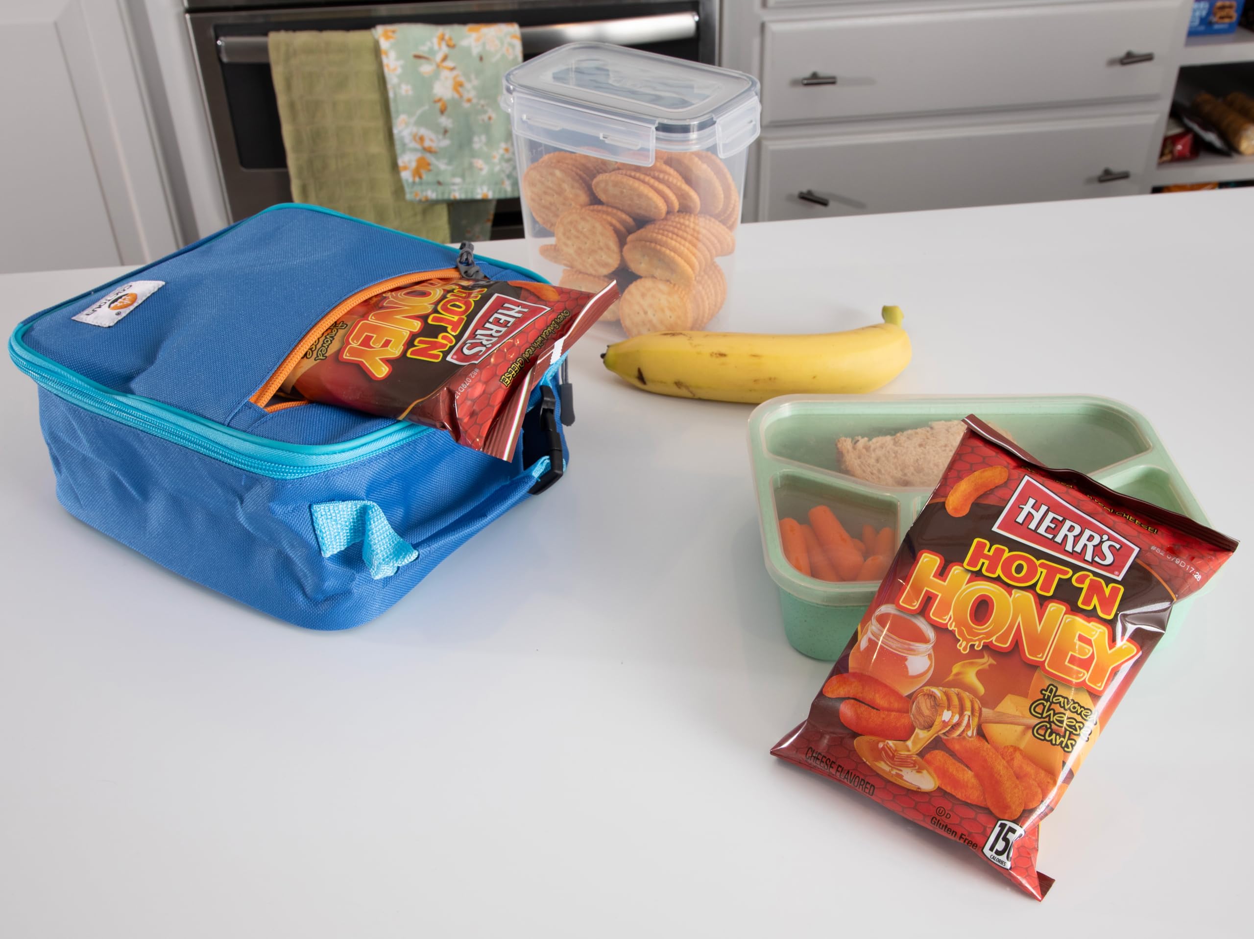 Multi-pack Herr's Hot & Honey Cheese Curls ready for sharing.