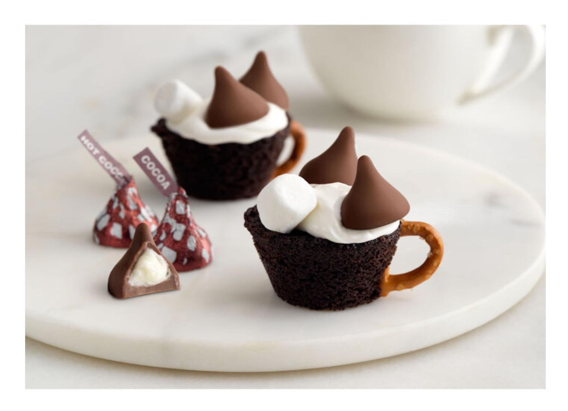 Hershey Hot Cocoa Kisses on a festive holiday table setting.