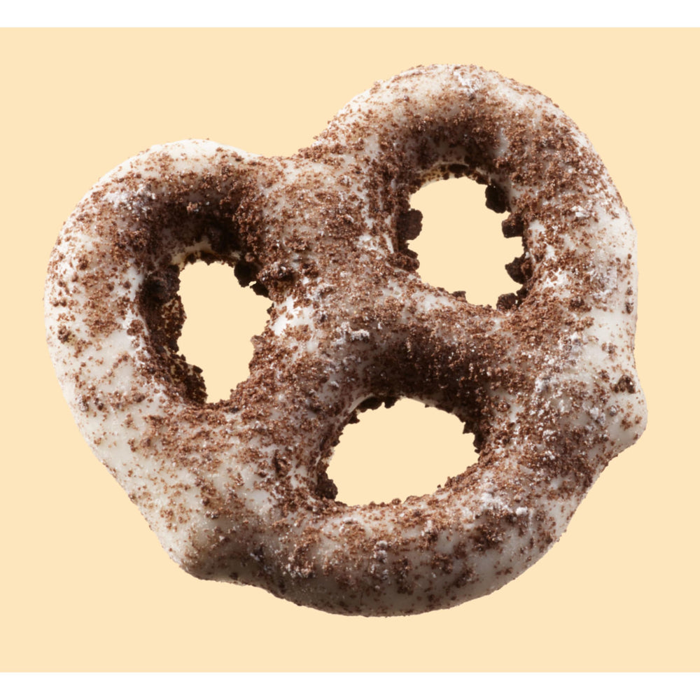 Hershey's Cookies 'n' Creme Dipped Pretzels cookie bits detail, adds crunchy sweetness.