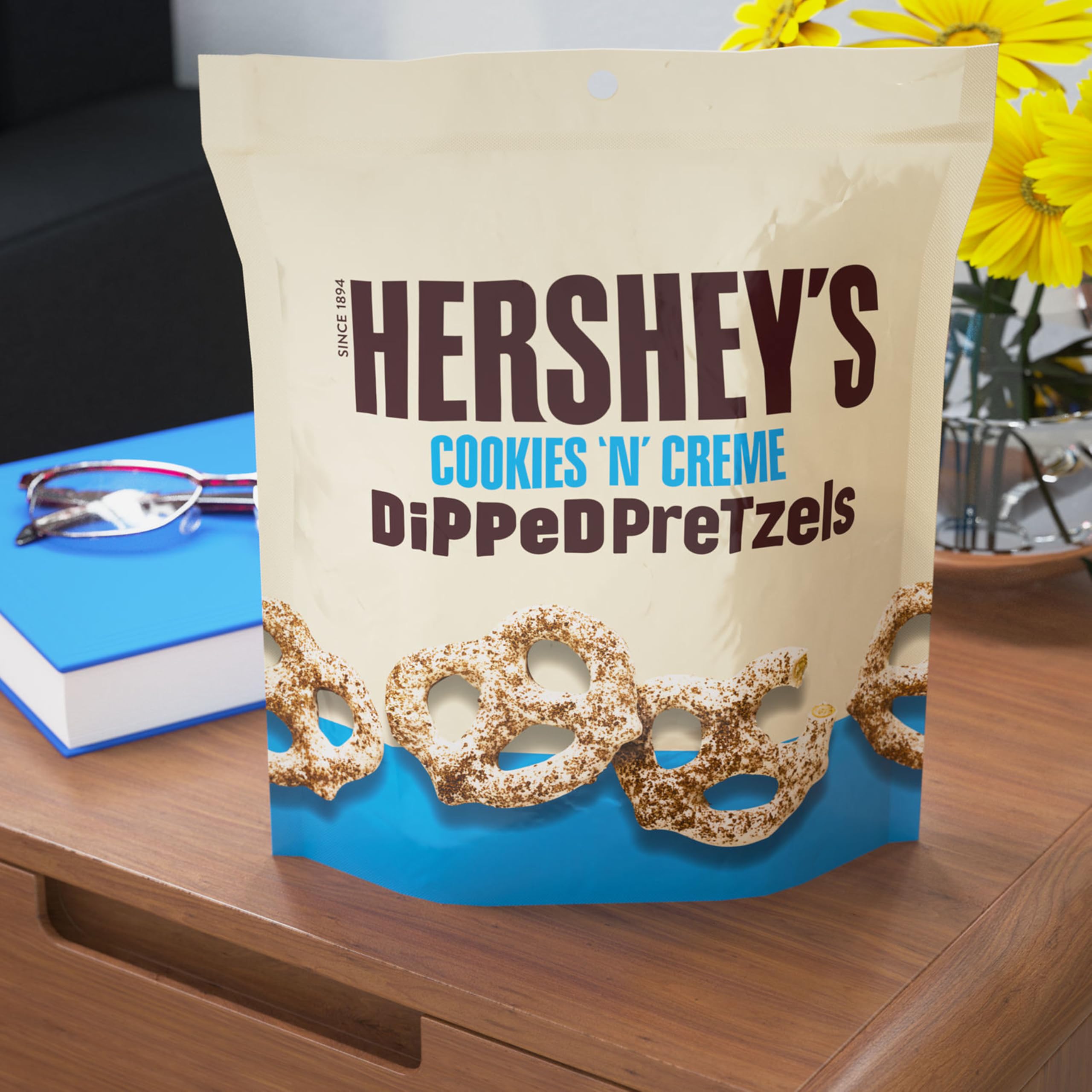 Hershey's Cookies 'n' Creme Dipped Pretzels in an office setting, convenient desk snack.