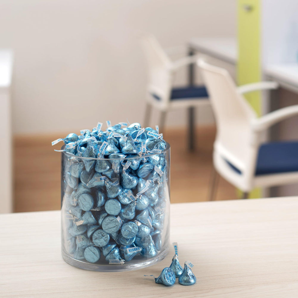 HERSHEY'S KISSES on a dessert buffet with blue foils for color.