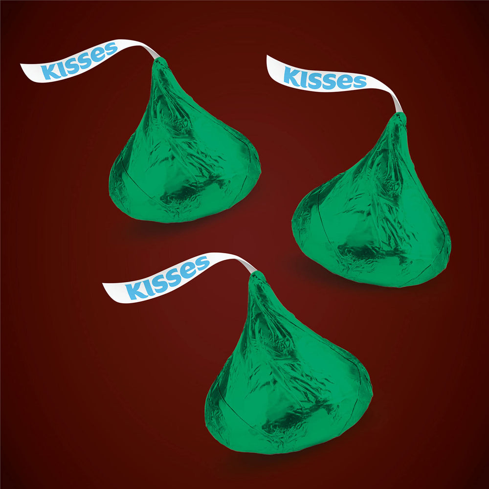 HERSHEY'S KISSES green-foil wrapped candies on display for holidays.