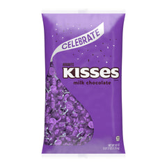 HERSHEY'S KISSES milk chocolate closeup shows creamy texture in bite-sized pieces.