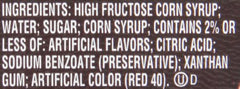 Hershey's Strawberry Syrup topping freshly made dessert on pancakes