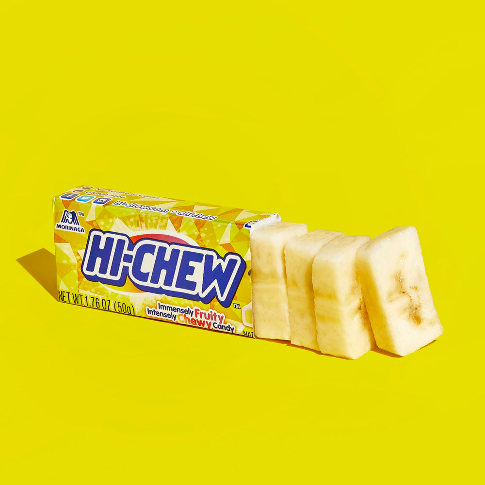 HI-CHEW Banana Sticks branding with bright packaging display.