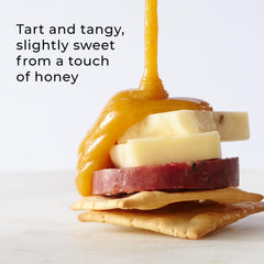 Hickory Farms Honey Pineapple Mustard on a charcuterie spread with meats and cheeses