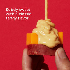 Hickory Farms Sweet Hot Mustard on a charcuterie board enhances flavor with balanced heat