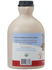 Hidden Springs Maple syrup pours over pancakes, showcasing silky texture and aroma.