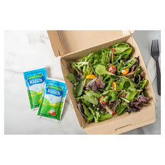 Hidden Valley Ranch dressing packets in a salad bar lineup.