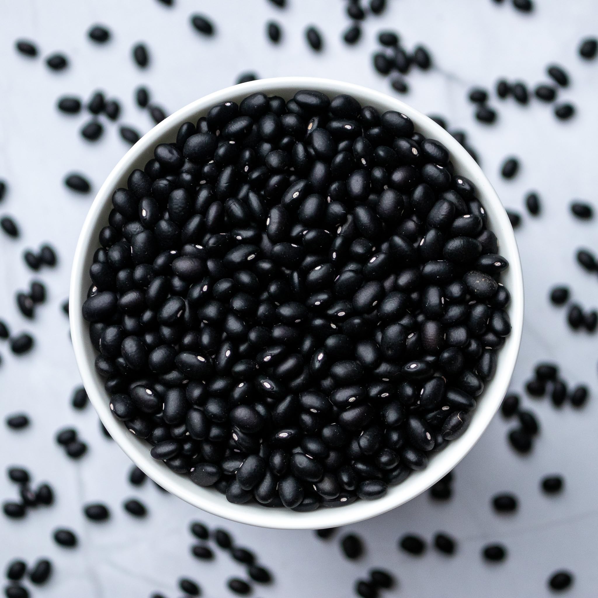 Soaking High Plains Black Beans in water to soften for cooking