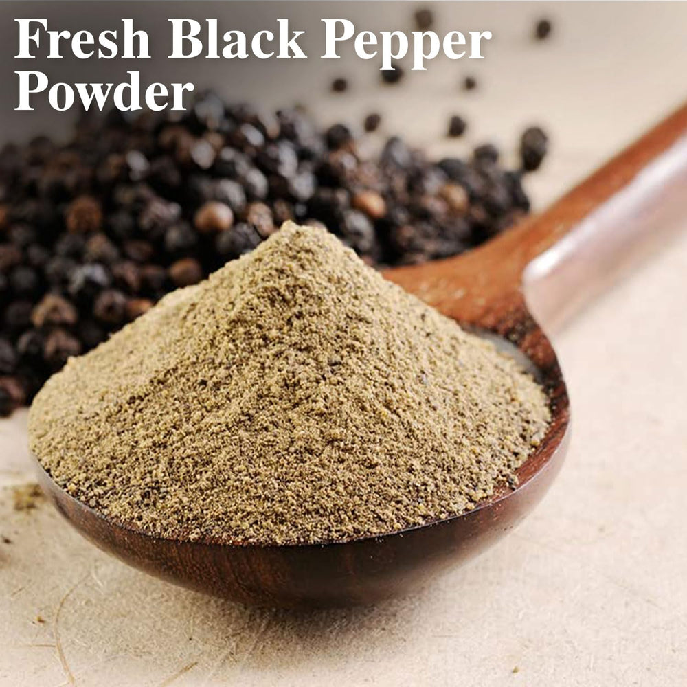Pouring Himalayan Chef black pepper powder onto roasted vegetables