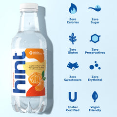Close-up of Hint Tangerine water glass showing crisp citrus taste