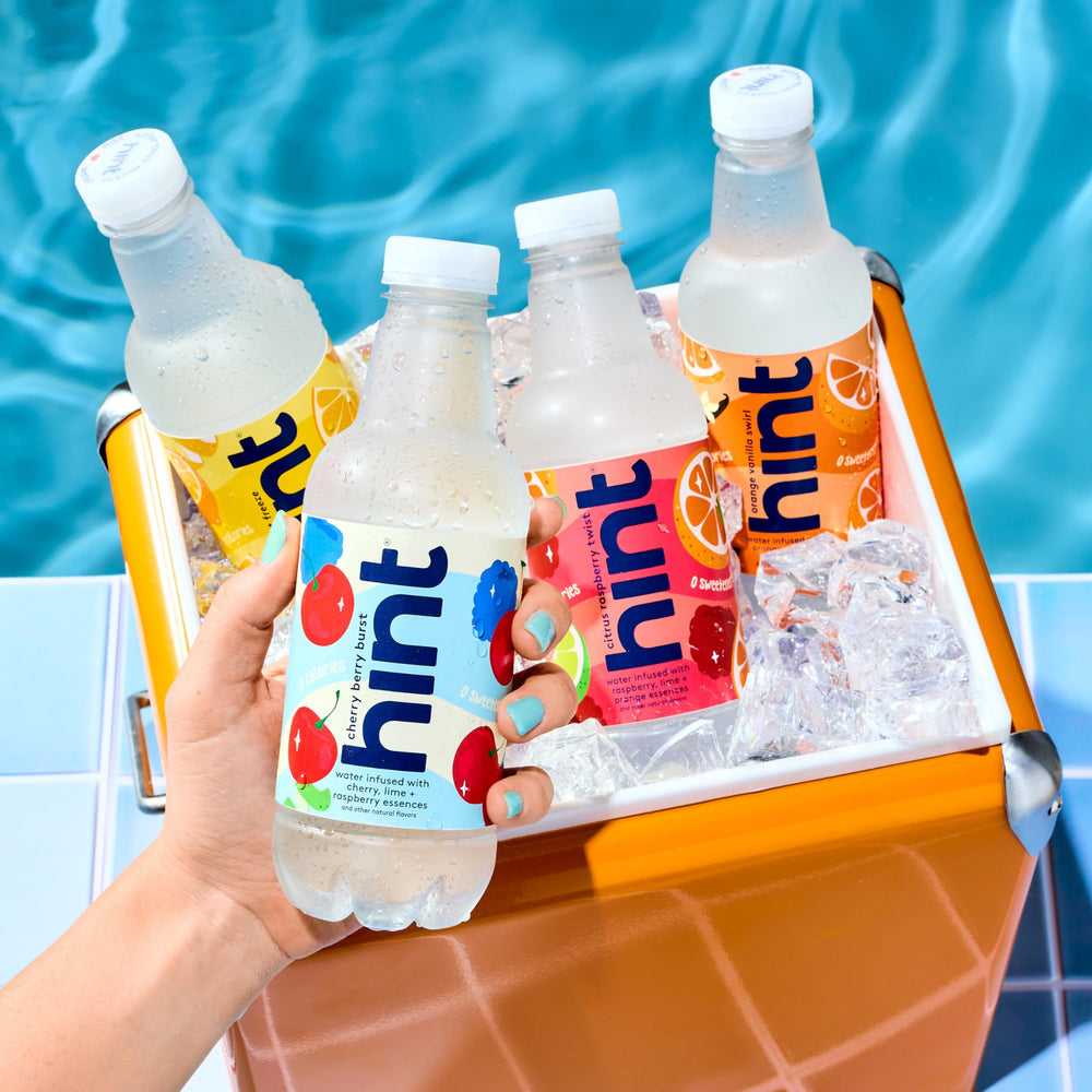 Hint vegan, gluten-free, kosher badge on bottle highlights inclusive, clean options.