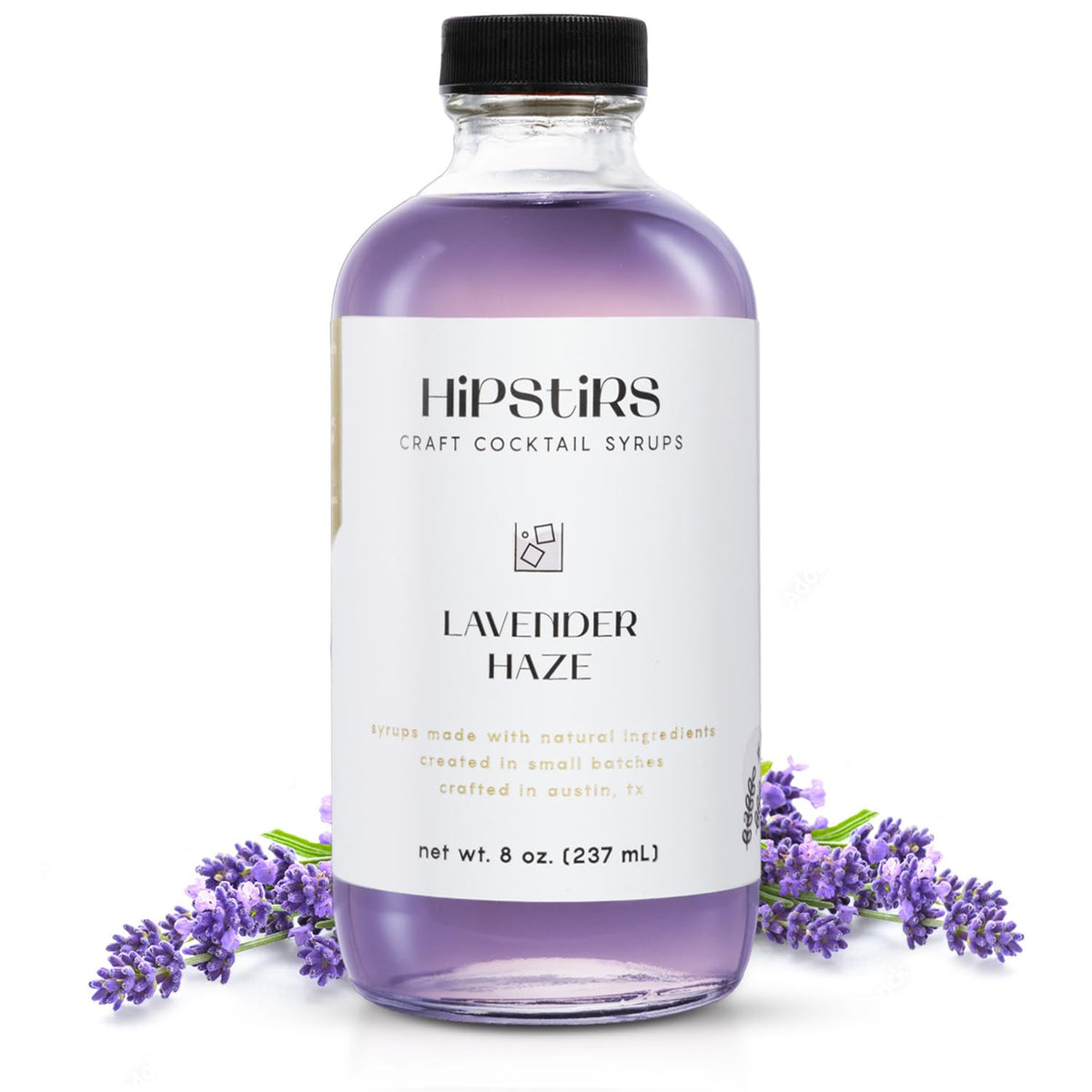 HipStirs Lavender Haze Syrup bottle on a bar, ready for quick cocktails