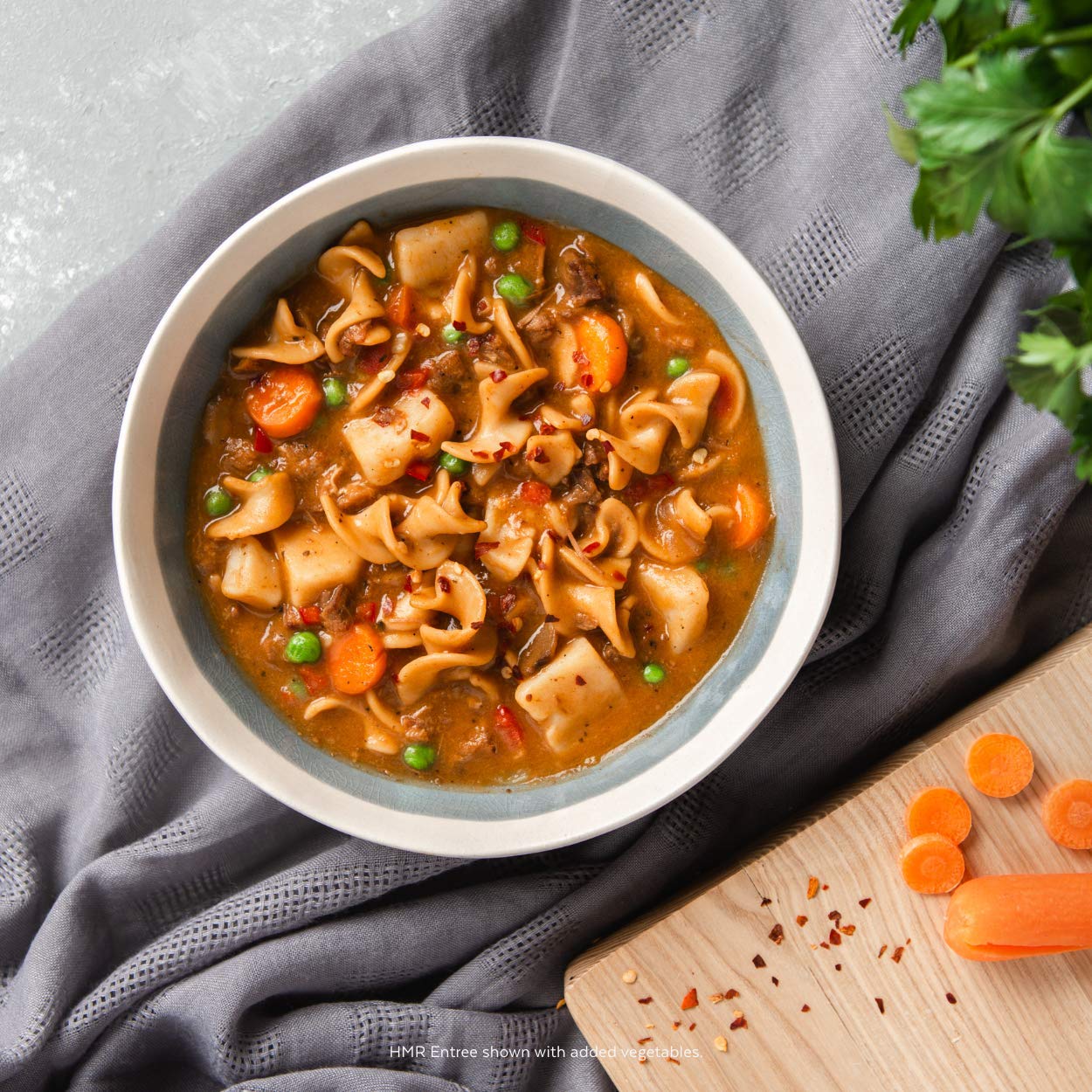 HMR Entrees Vegetable Stew with Beef ingredients – colorful vegetables with lean beef in a balanced mix.