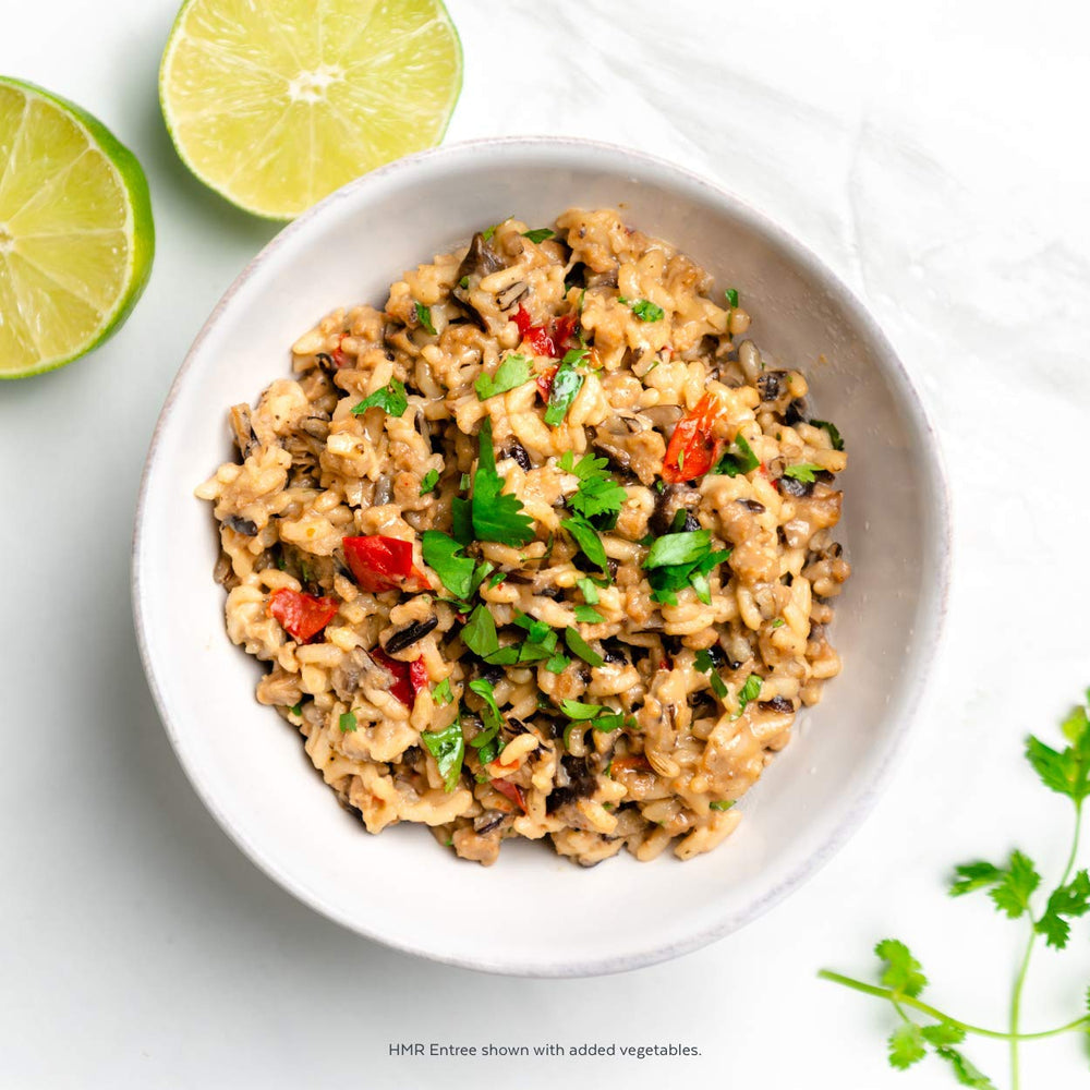 HMR Mushroom Risotto Entrée with mushrooms and peppers in a creamy cheese sauce.