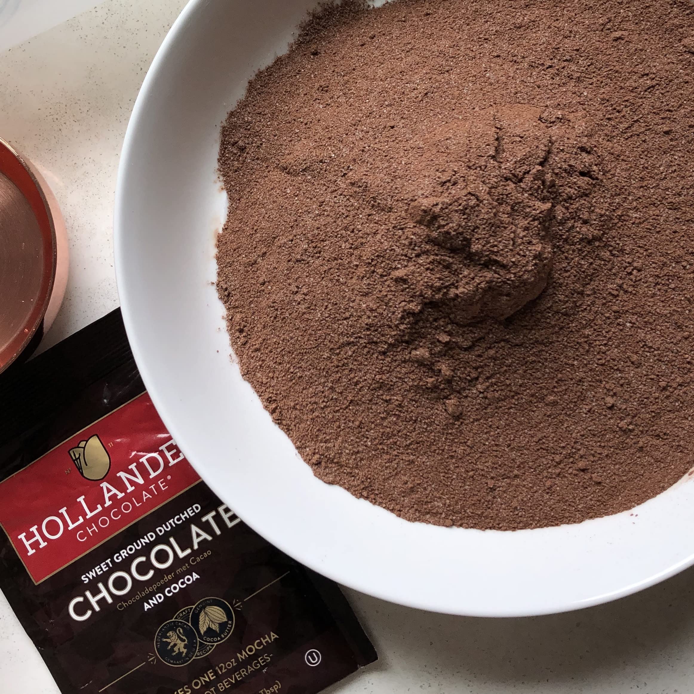 Hollander Chocolate hot cocoa steaming cup shows ready-to-serve richness and silky texture