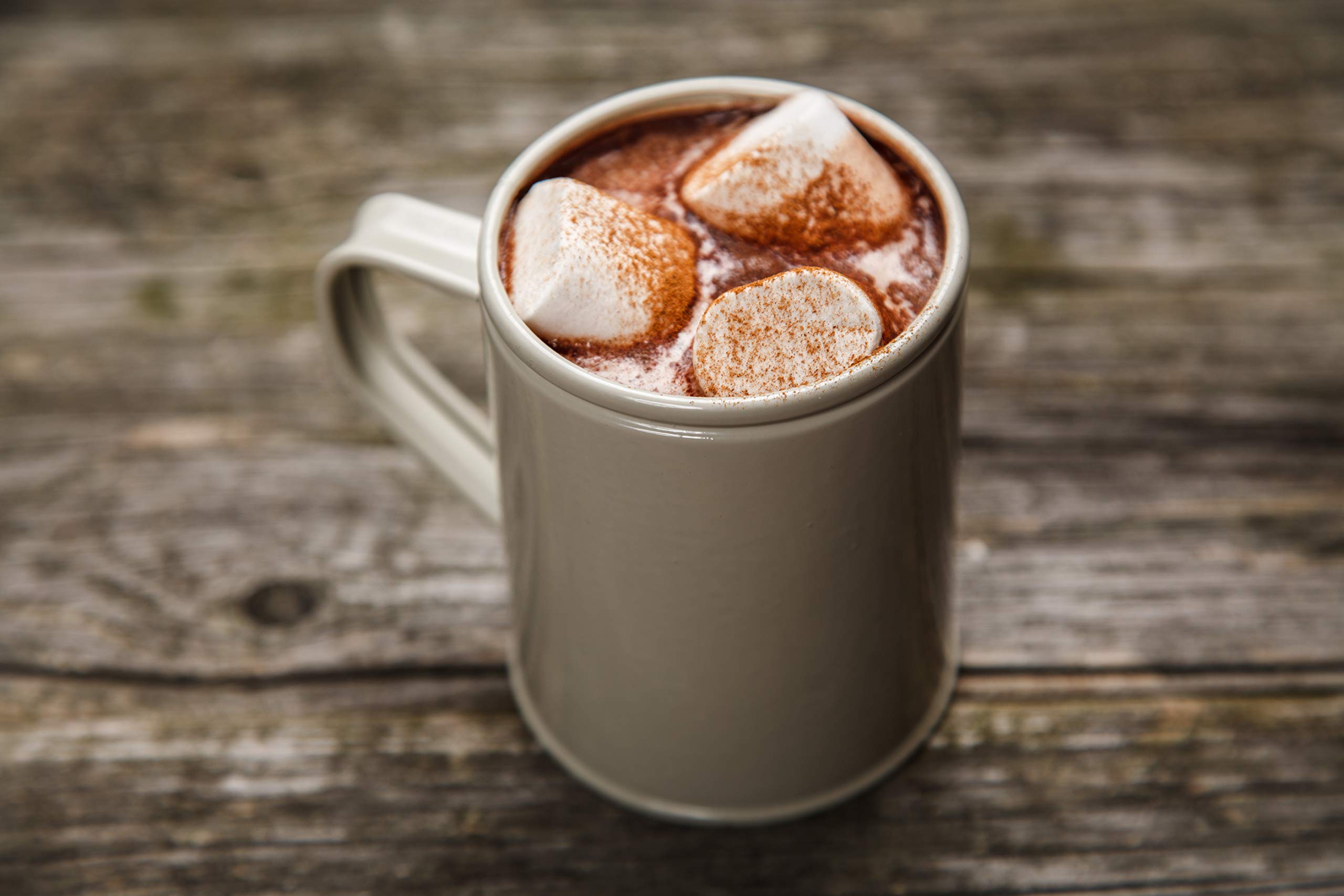 Hollander Chocolate mocha drink pour illustrates versatile mixable powder for café-style beverages