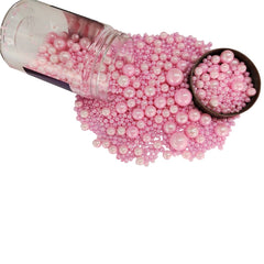 Homankit pink sugar pearls bottle adds vibrant decor to cakes and cupcakes for festive occasions.