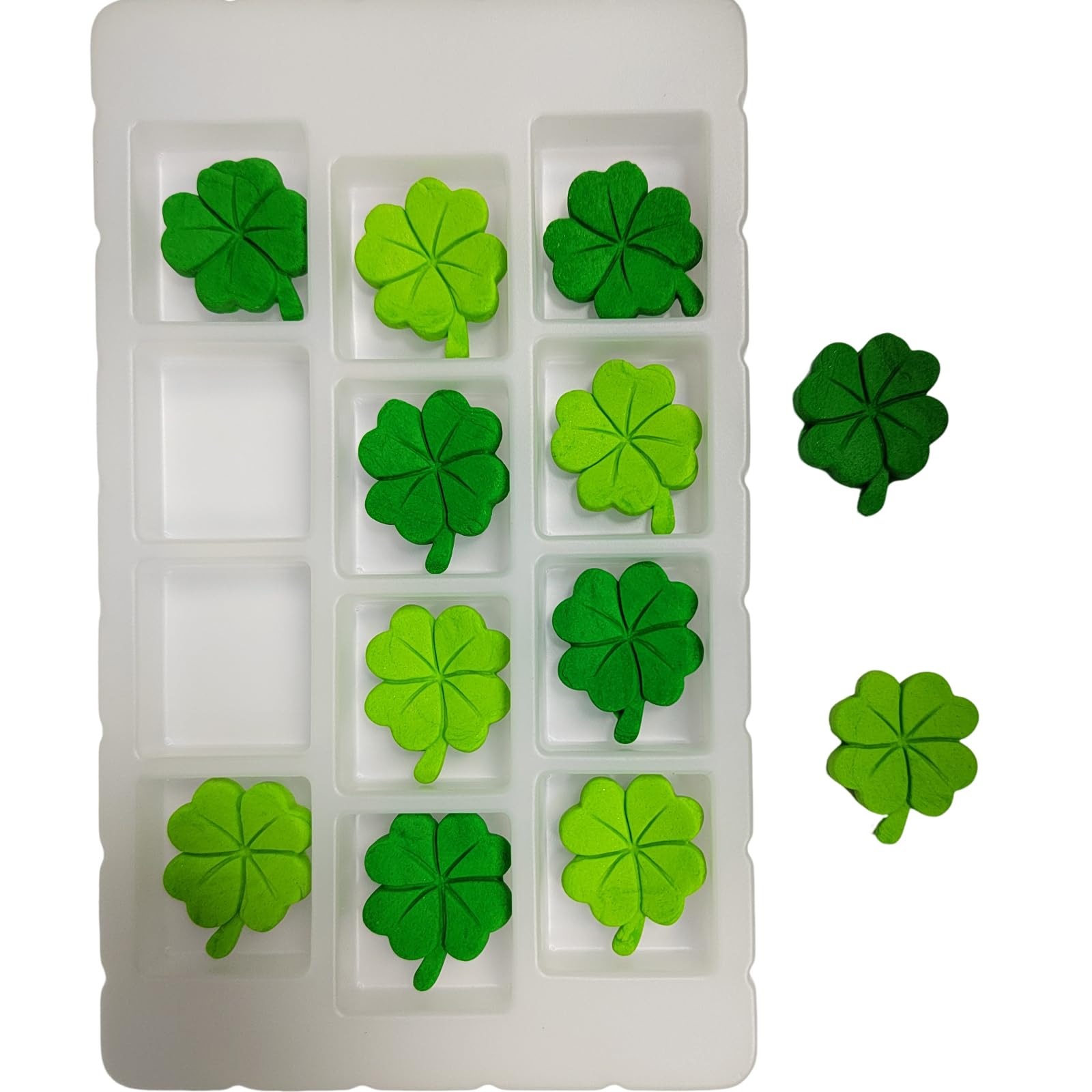 Homankit green shamrock candy toppers on cupcakes for decorating
