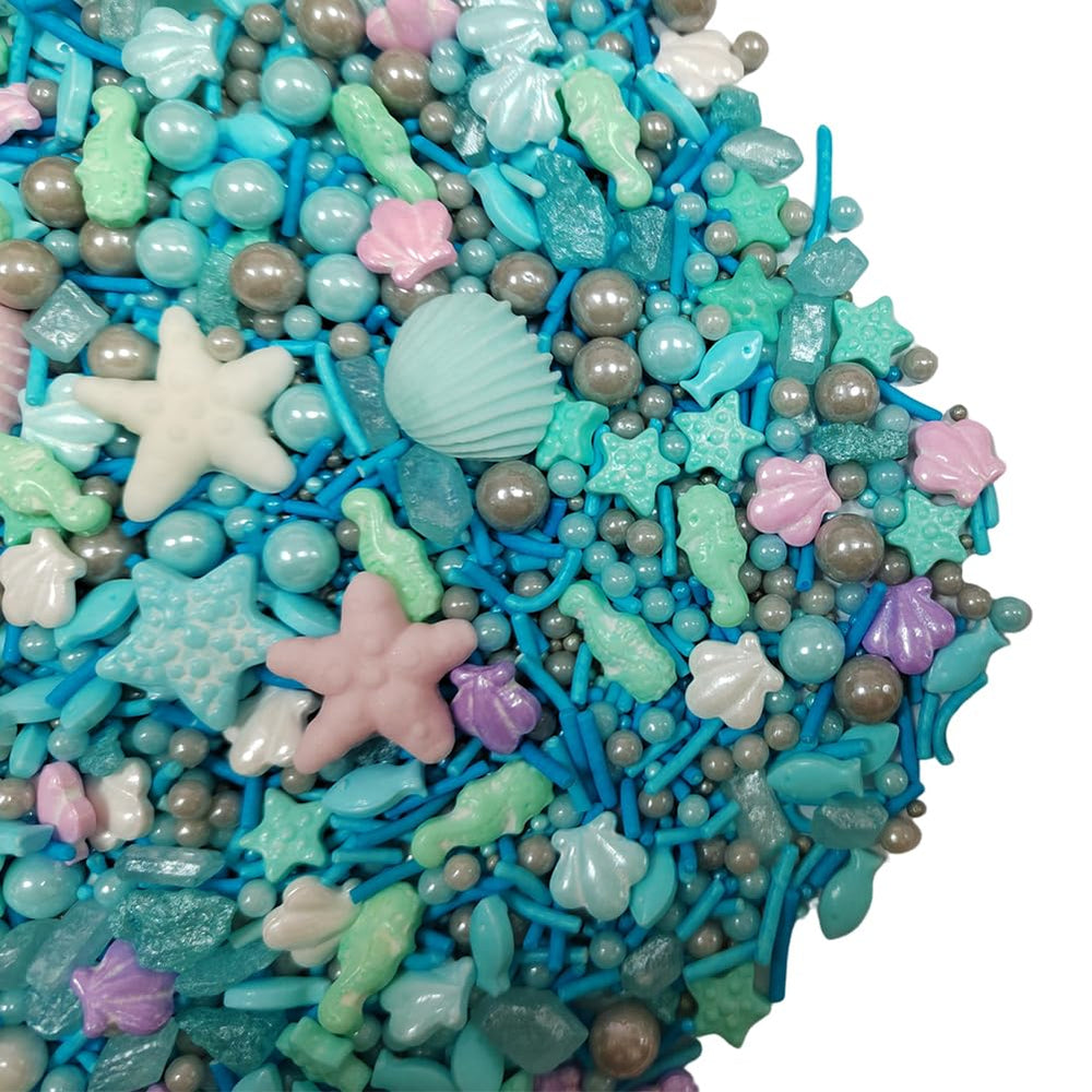 Homankit Ocean Sprinkles decorate cake toppers with ocean-inspired accents.