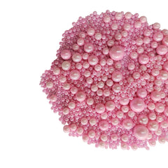 Homankit pink sugar pearls embellish jumbo cupcakes with sparkle and delightful crunch.