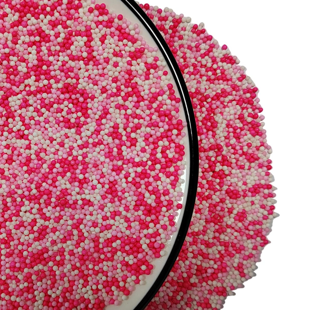 Homankit Valentines sprinkles decorate cake pops and ice cream toppings.