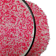 Homankit Valentines sprinkles decorate cake pops and ice cream toppings.