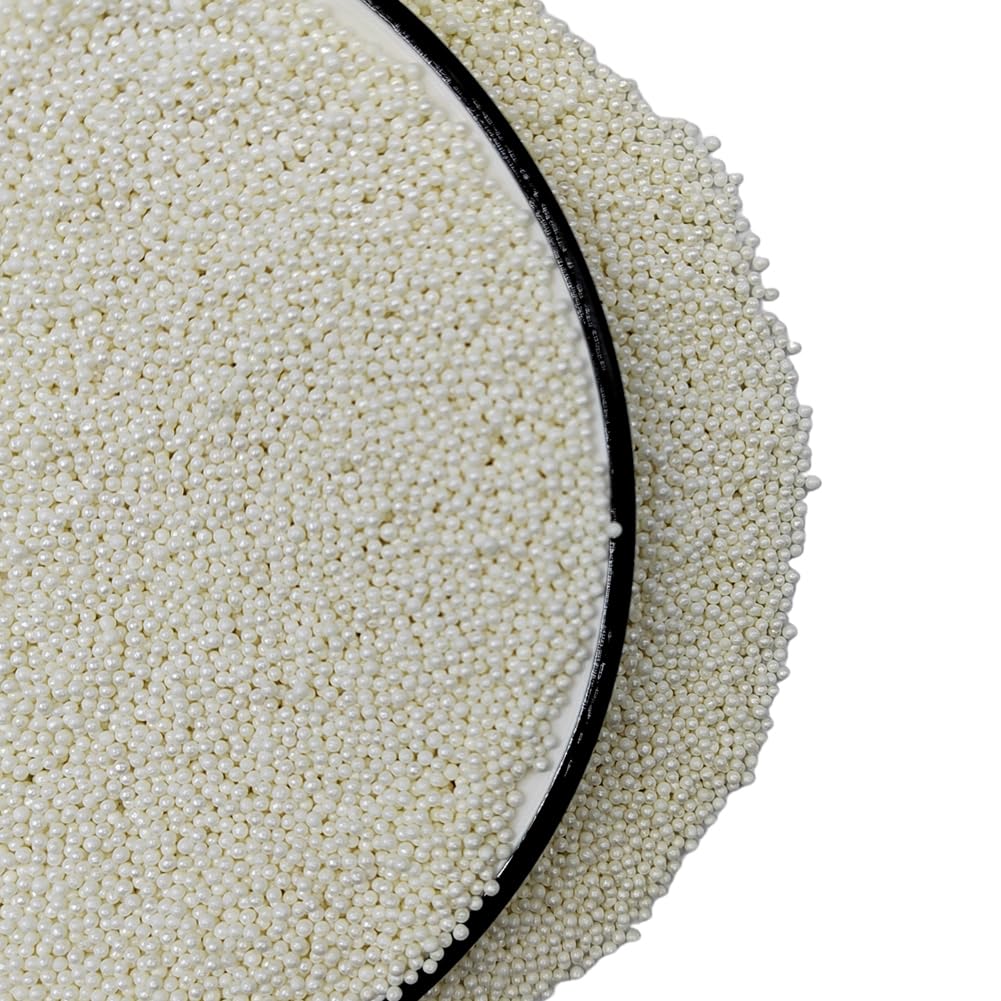 Homankit sprinkles close-up shows tiny white pearls ideal for cookies and cupcakes.