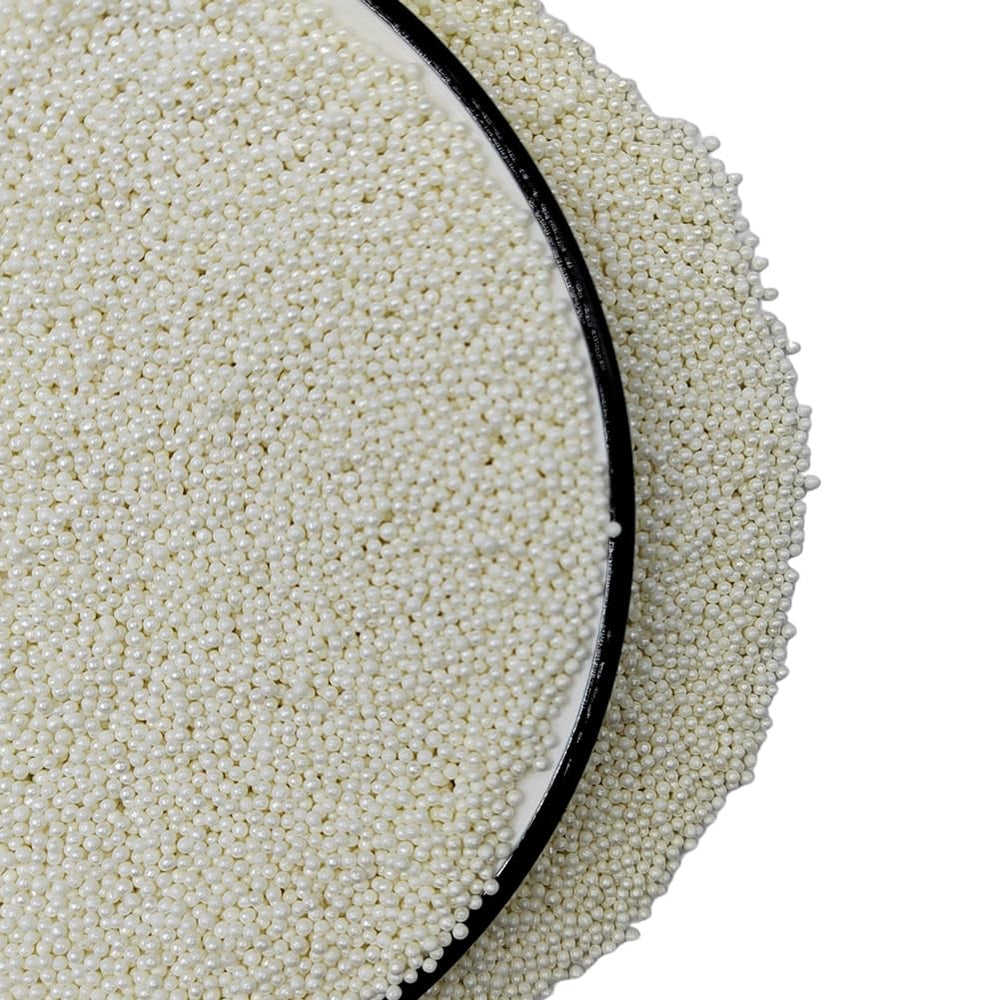 Homankit sprinkles close-up shows tiny white pearls ideal for cookies and cupcakes.