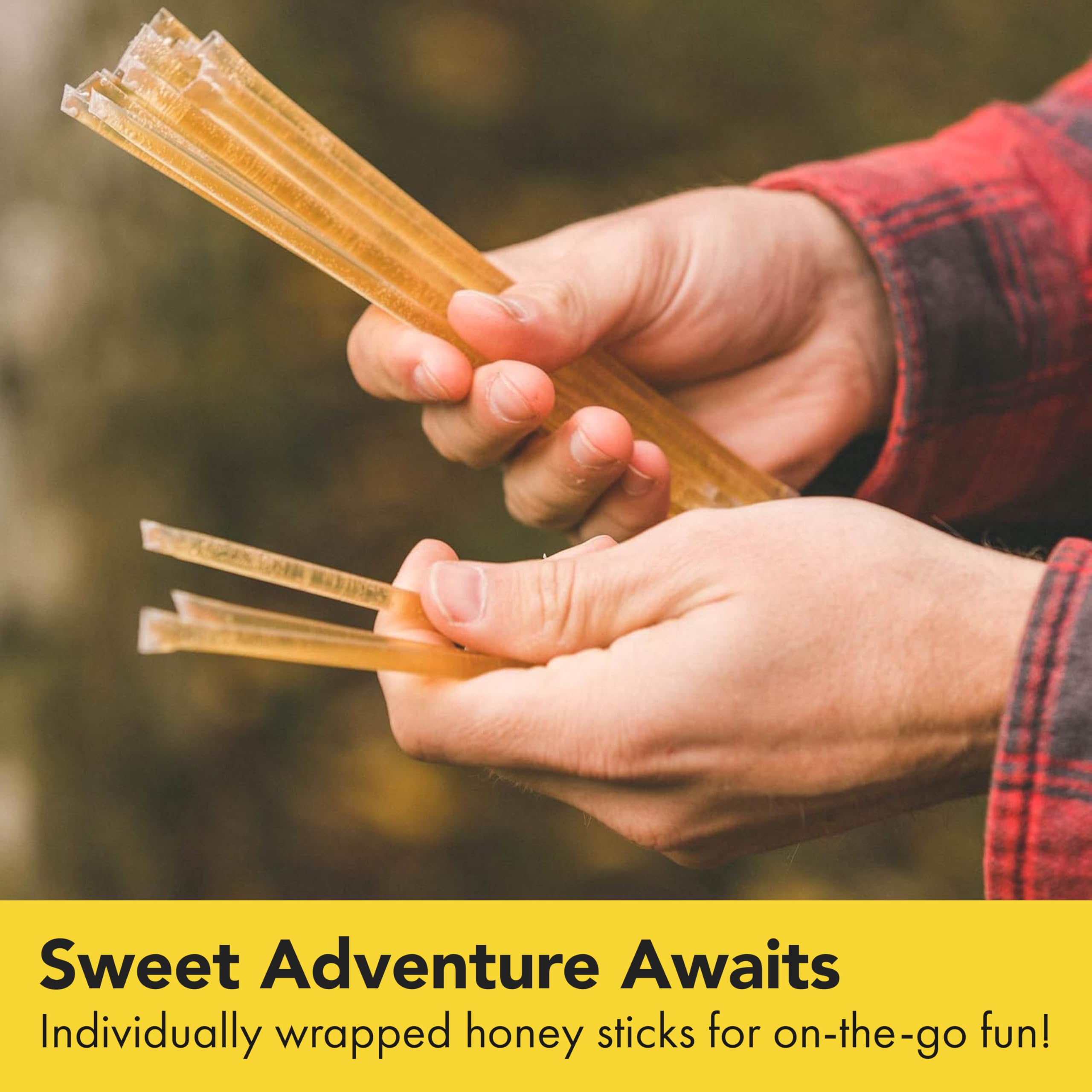 Close-up view of a single-serve Homestead Honey stick for portable use.
