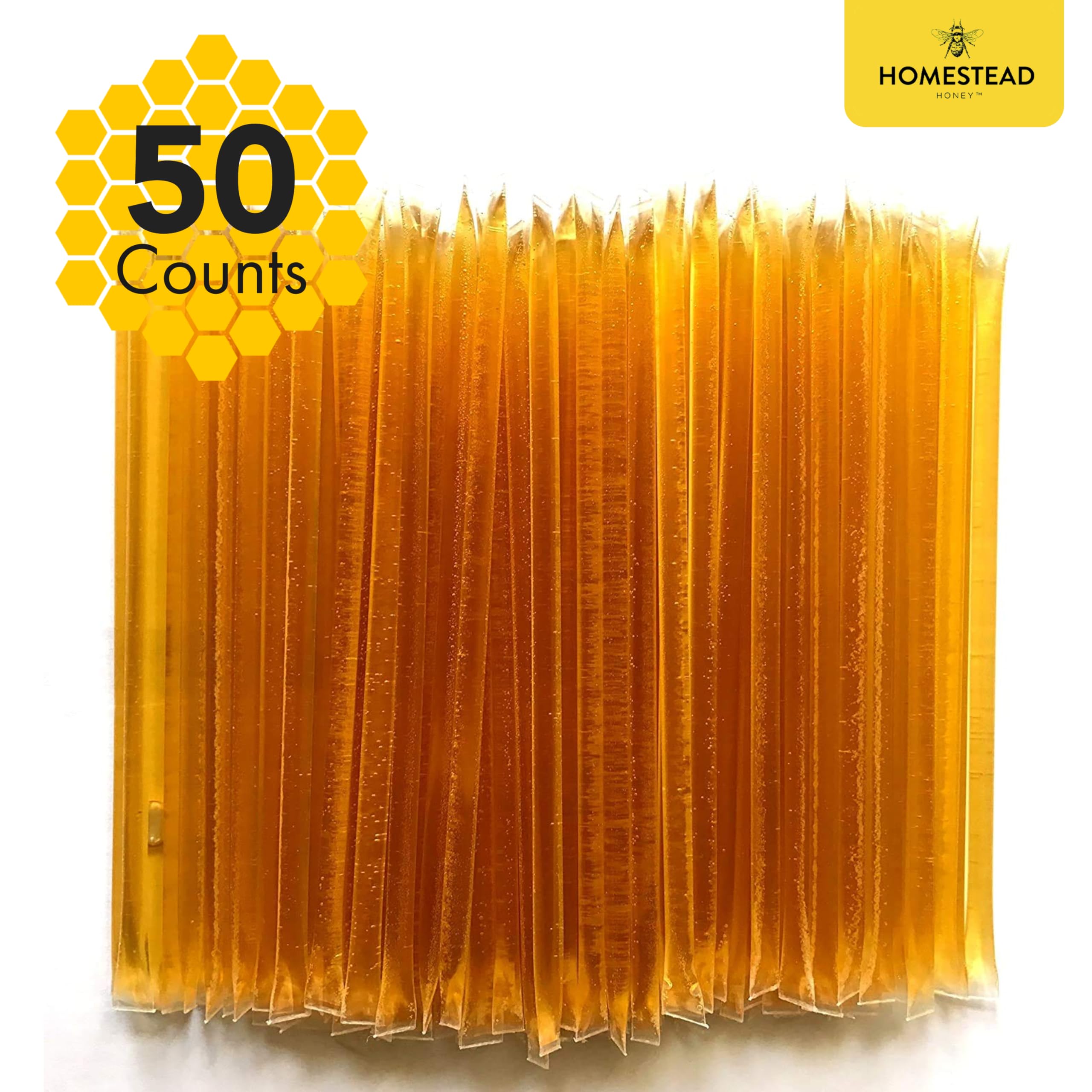 Homestead Honey sticks stirred into tea to show natural sweetness.