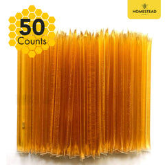 Homestead Honey sticks stirred into tea to show natural sweetness.