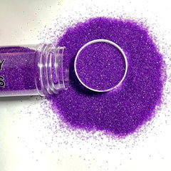 Homipooty purple sprinkles enhance ice cream with color and texture.