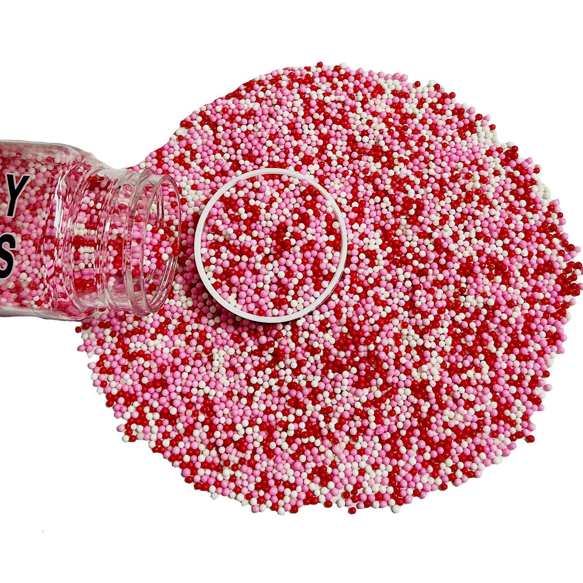 Homipooty Valentine nonpareils pearls in red, pink, and white add festive color to cakes.