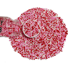 Homipooty Valentine nonpareils pearls in red, pink, and white add festive color to cakes.